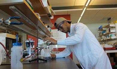 Manuel Pina, ’21, in a lab